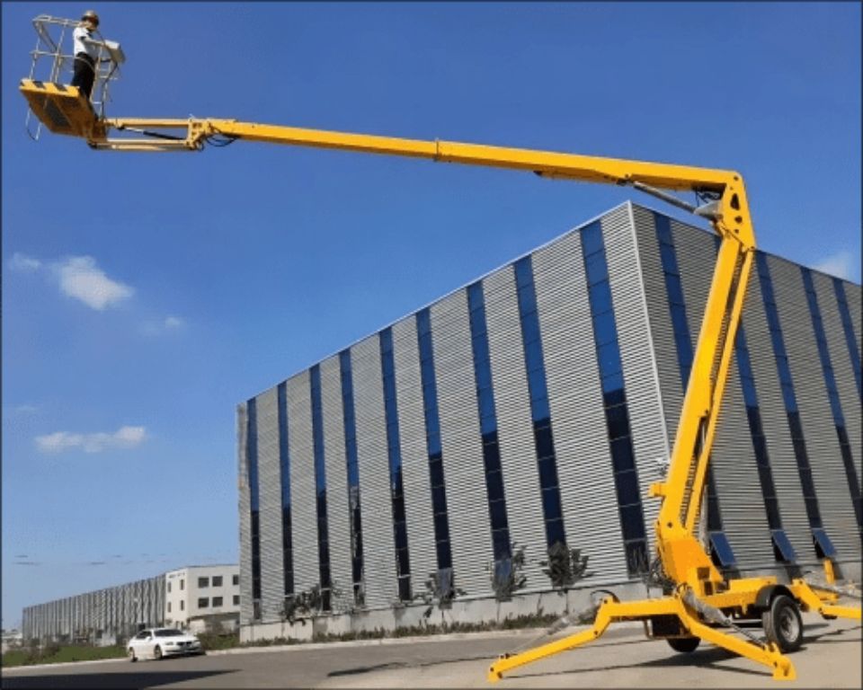 Electric telescopic self propelled boom lift platform by Home Lift Elevator