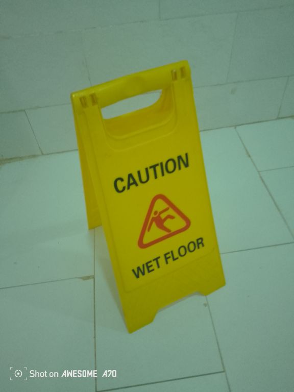 Yellow Caution Wet Floor Sign By Hiphen Solution