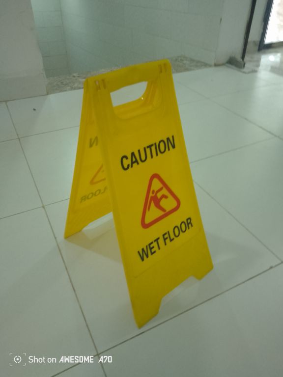 Caution Wet Floor Safety Sign By Hiphen Solution