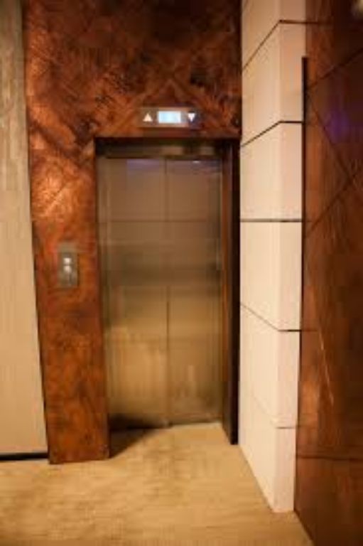 Stainless steel commercial elevator platform by Home Lift Elevator