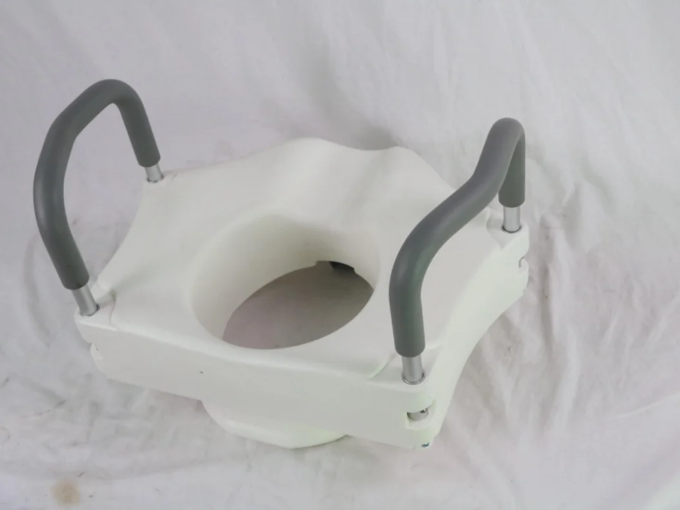 Toilets set Raiser with handles maintenance services in Nigeria by Scantrik